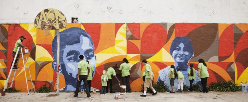 community painting a mural