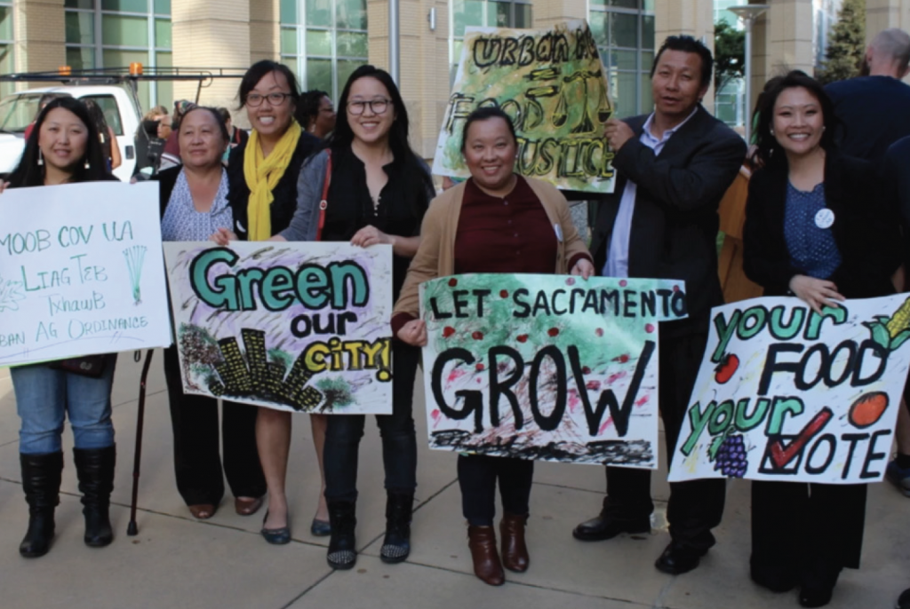 healthy food advocates holding signs