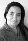 black-and-white headshot of Rachel against a white background